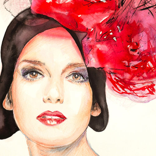 Girl in a black hat with red tulle
